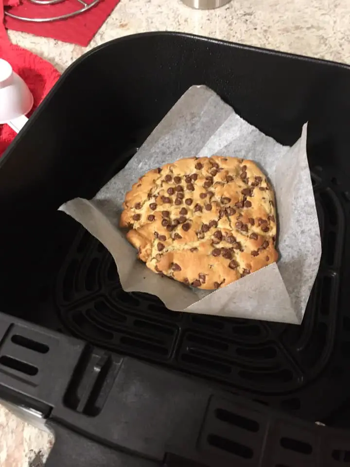 Making a cookie in air fryer with parchment paper as a liner